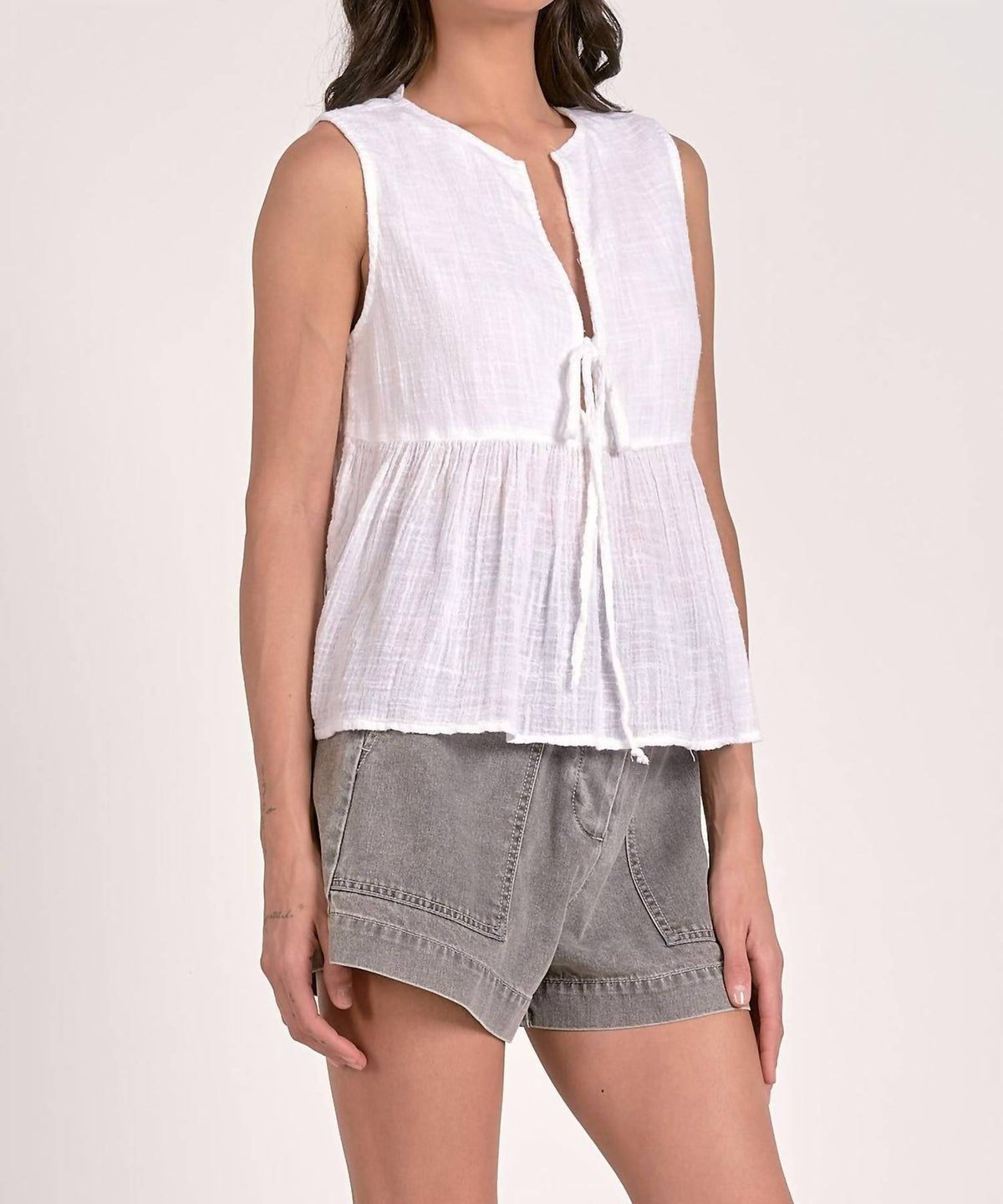 Elan - Sleeveless Flyaway Top